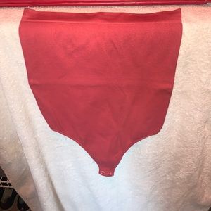 pink strapless body suit